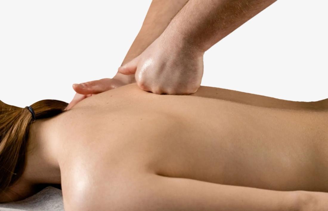 massage on a womans back using Friction Techniques