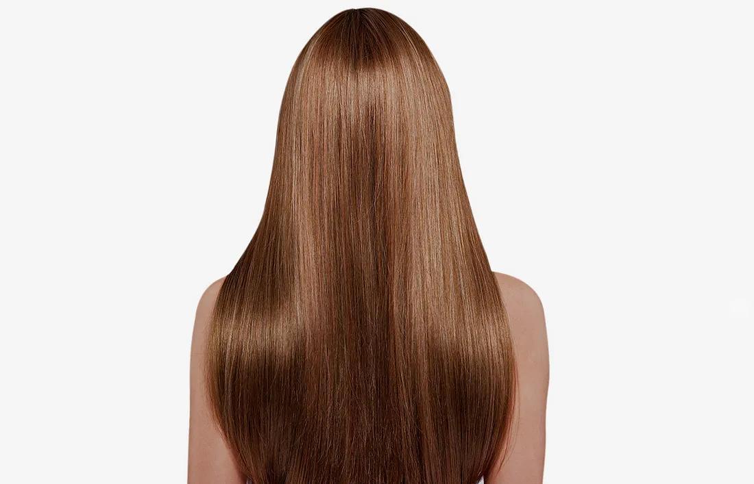 A girl showing her backside of hair