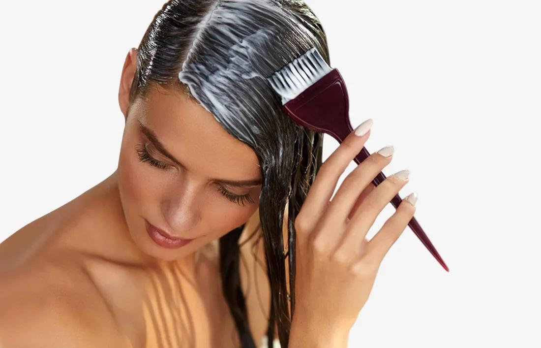 A Girl Conditioning her Hair