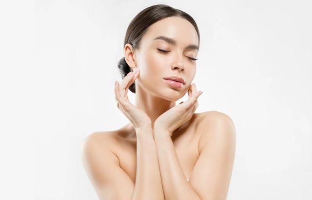 A woman Showcasing her face after Facial Skincare
