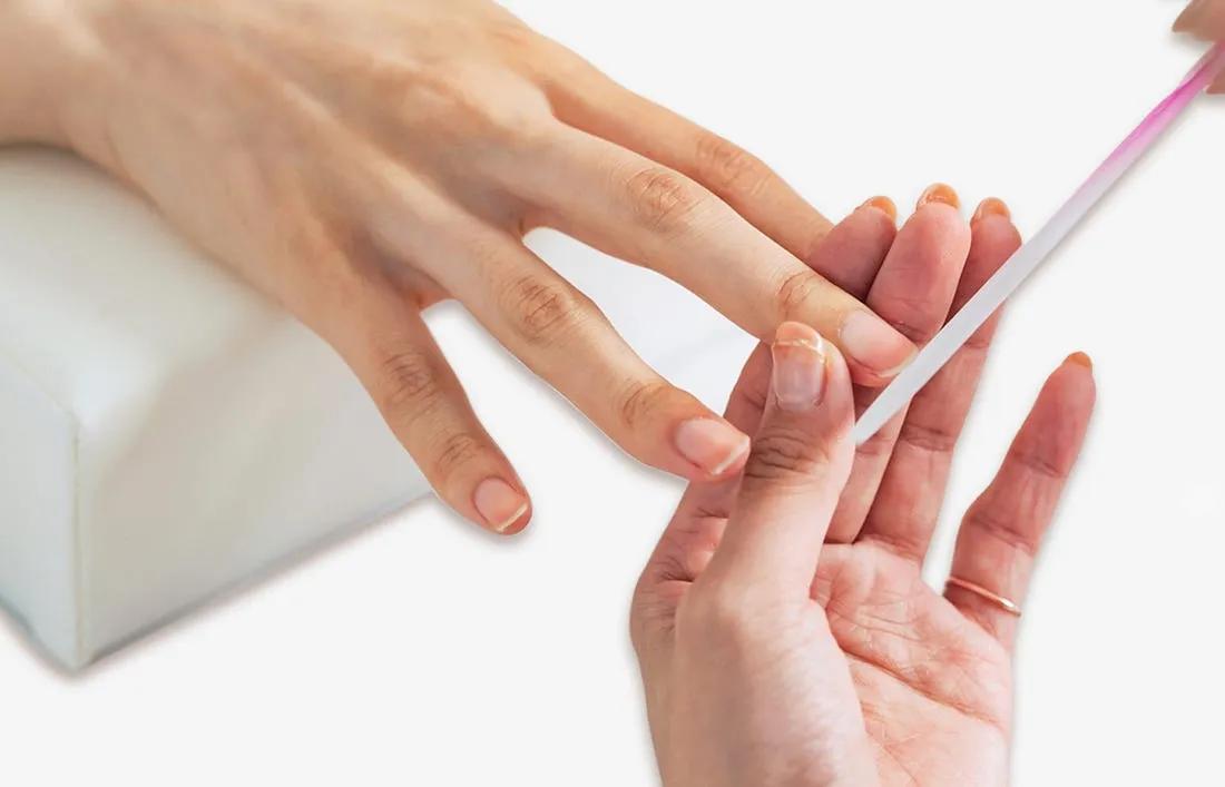 Maintenance and care given by a woman to her nails